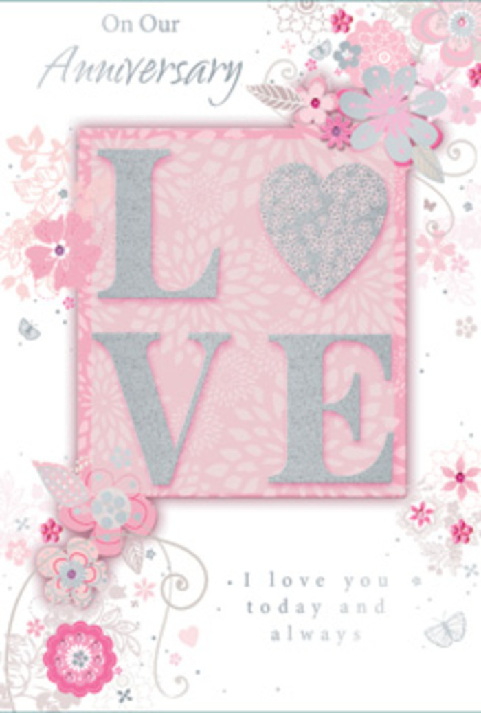 This anniversary card feels like a carefully arranged floral tableau, much like a bespoke bouquet designed for a Kingston Vale couple by an experienced florist. The eye is immediately drawn to the central word LOVE, each letter crafted in a raised, textured style that visibly catches the light. A dusting of glitter in soft blush pink, pearlescent white, and fine silver outlines gives the letters a subtle sparkle, reminiscent of early-morning frost on garden petals. The surface appears pleasingly tactile, inviting a tender touch as someone reflects on years spent together. The surrounding background is a gentle pastel pink, smooth and evenly toned, bathing the entire card in a warm, romantic glow. Flowing outward from the central word, trails of stylised blooms and curved leaves form a light, swirling frame. The flowers are drawn with delicate, almost whimsical lines, their petals filled with washes of blush, mauve, ivory, and pale grey, suggesting the soft tones of an anniversary bouquet rather than precise botanical detail. Fine silver accents highlight edges and centres of the flowers, sparkling subtly like distant lights along Kingston Hill after sunset. Interspersed among the blooms are graceful flourishes and perhaps tiny butterfly shapes, adding gentle movement and a sense of celebration. An elegant message, scripted in flowing, calligraphic lettering, weaves through or beneath the design, expressing enduring love, gratitude, and shared memories. The overall impression is one of quiet, intimate joy, making this card a perfect accompaniment to fresh flowers delivered throughout Kingston Vale for a heartfelt anniversary surprise.