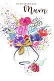 This Mother's Day card features a joyful, watercolour bouquet that seems to dance in the centre of the page, as if an artist in Kingston Vale has just lifted their brush after the final, expressive stroke. A simple vase anchors the piece at the bottom, outlined with soft, translucent shades of blue and grey that give the impression of smooth ceramic or glass, finished with an elegant golden bow tied carefully at its waist. From this base, the flowers burst upward in a lively mix of colours: saturated cerise and fuchsia blooms mingle with rosy pinks, their petals loosely defined by bold indigo lines that curl and sweep, lending energy and movement. Cooler notes of lavender, periwinkle, and pale blue thread through the bouquet, soothing the eye and suggesting gentler blossoms that offset the stronger shades. Touches of fresh chartreuse and leafy green peek out, hinting at stems and foliage that have been indicated with just a few confident strokes, like the quick gestures a florist makes when planning an arrangement for delivery through Kingston Vale and the nearby Richmond Park area. Fine gold accents highlight parts of petals and leaves, lightly shimmering as though illuminated by early evening light, and reinforcing the sense that this bouquet is something precious. Surrounding the composition, scattered hearts and delicate splashes of paint drift across the crisp white background, echoing the playful, affectionate mood of the day. The image feels both spontaneous and considered, capturing the spirit of saying thank you and I love you to a beloved mum with colour, texture, and warmth rather than words alone.